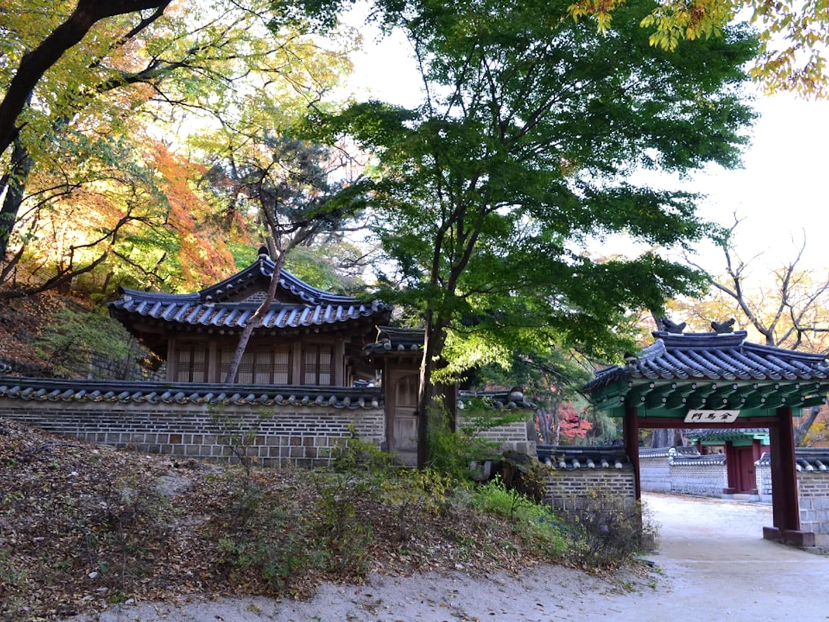 A japanese style building with a fence around it in Korea