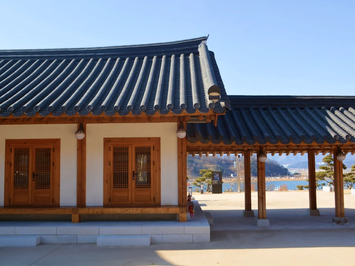 a building that has a lot of pillars in front of it