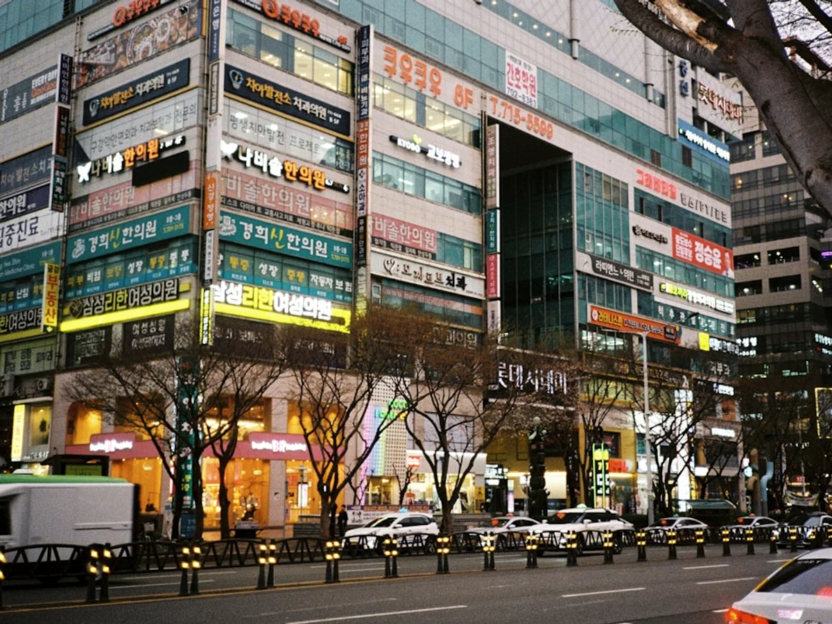 A busy city street with tall buildings. related to Exploring the best affordable in Korea